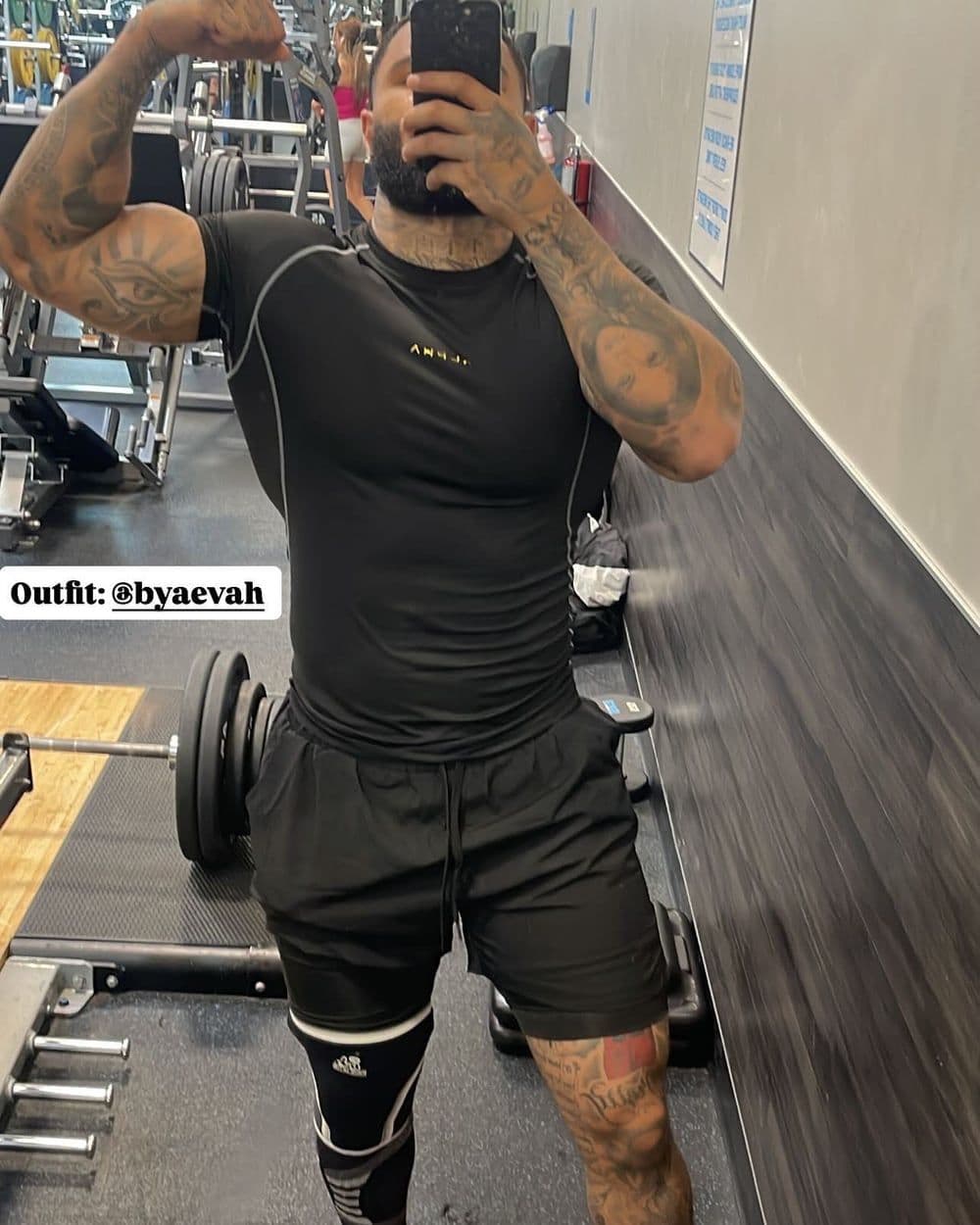 ALPHA black compression tee at the gym