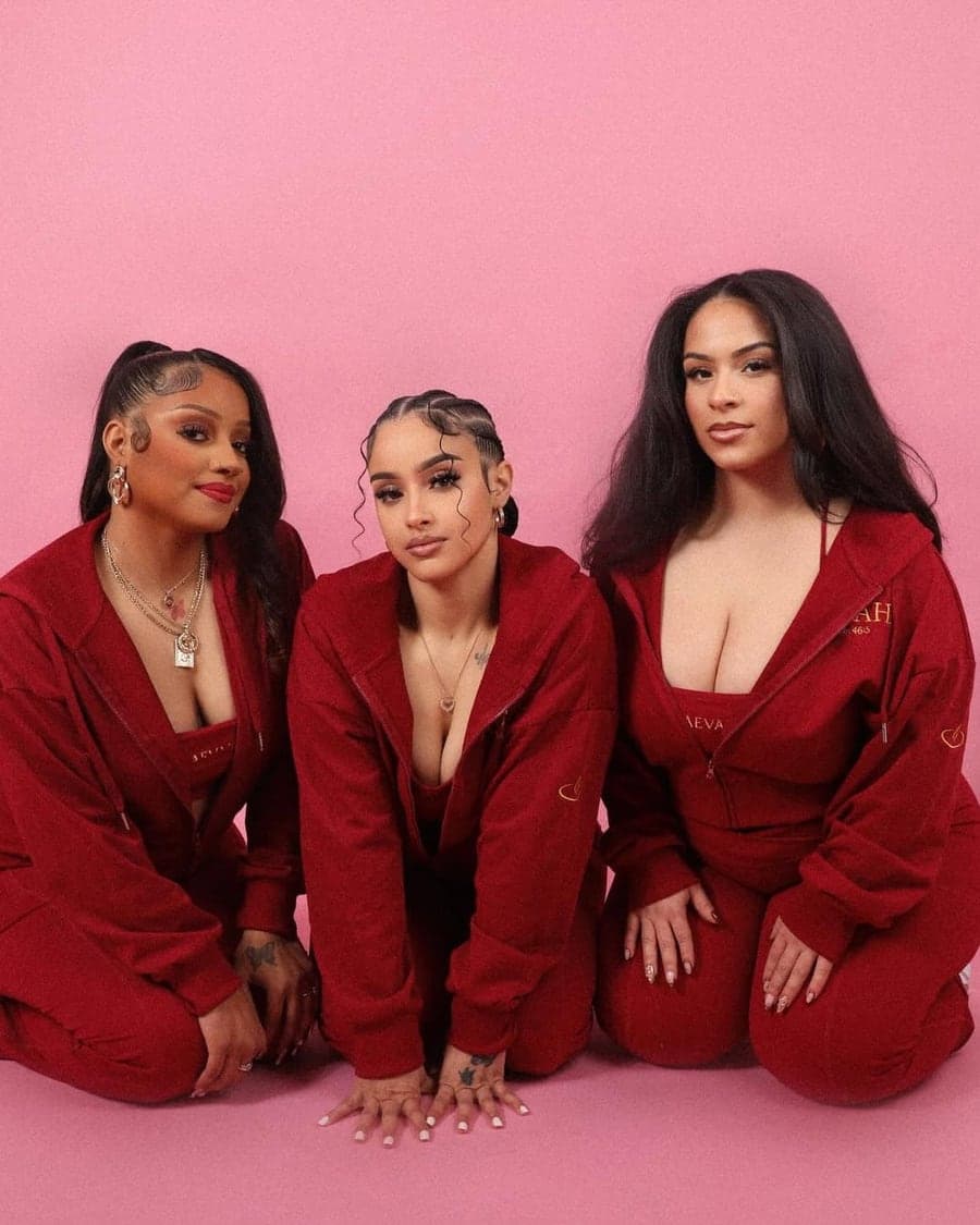 Three women in the AEVAH burgundy sets