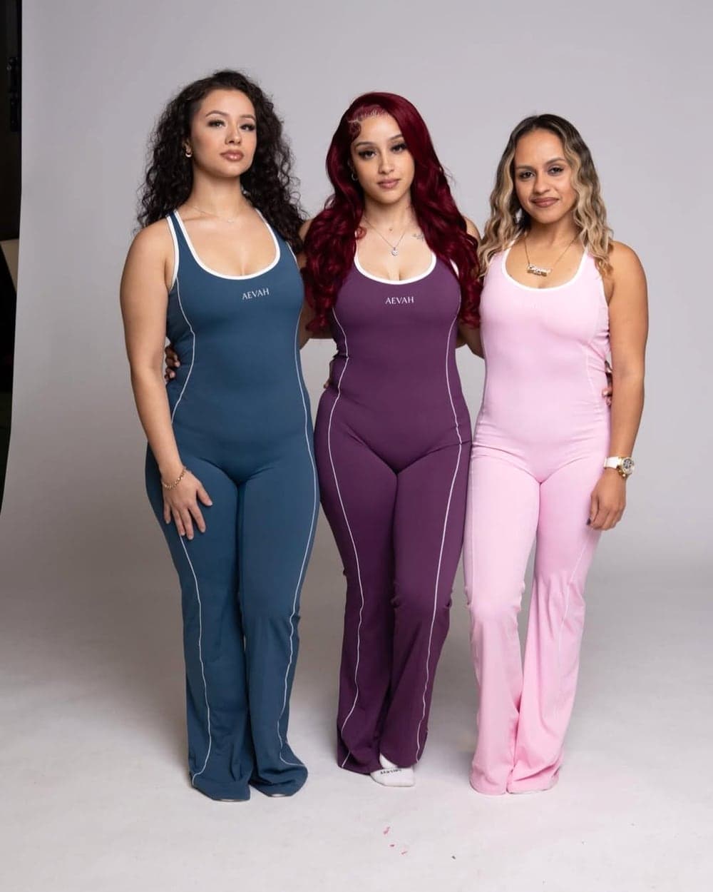 Three women in AEVAH sets in the studio